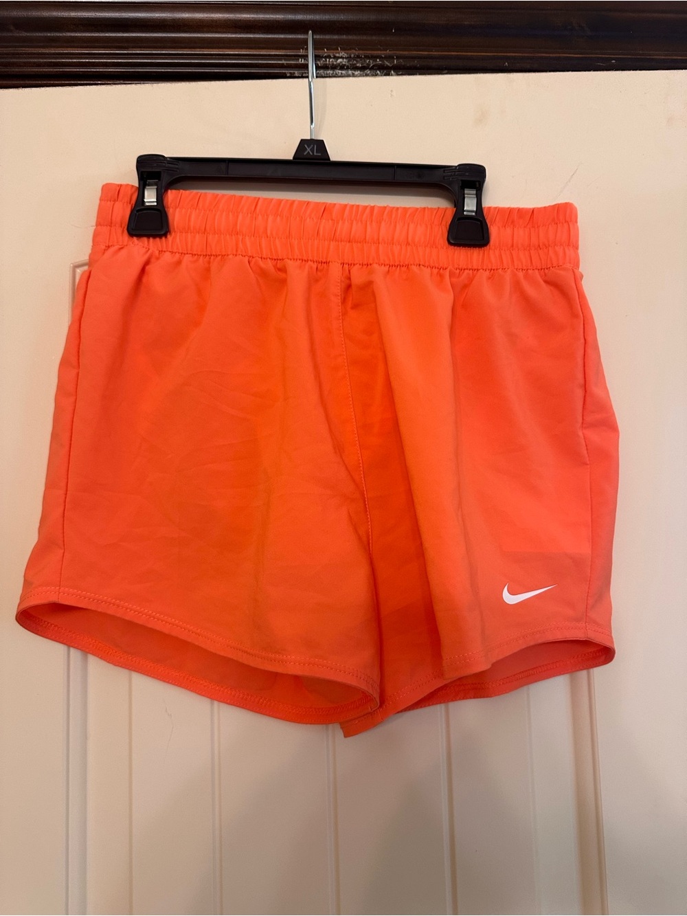 Nike Kids’ Bright Orange Athletic Shorts with White Swoosh